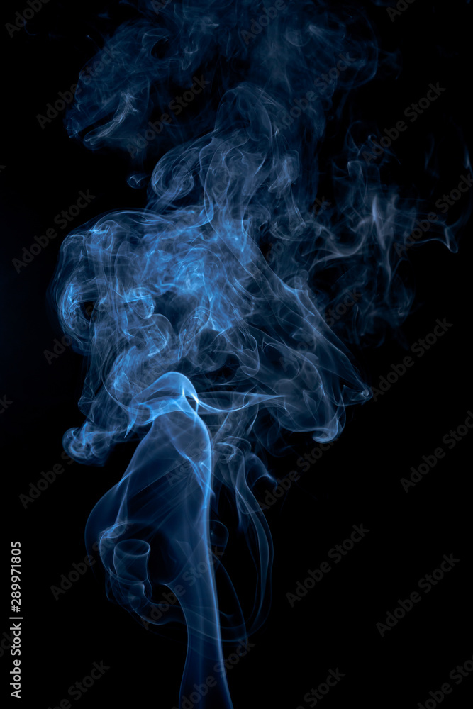 Blue smoke on dark background Blue smoke on dark background