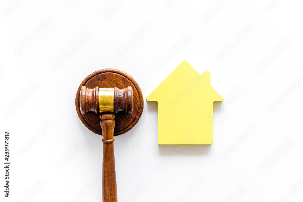 Inscribed gavel, house figure for inheritance concept on white background top view Inscribed gavel, house figure for inheritance concept on white background top view