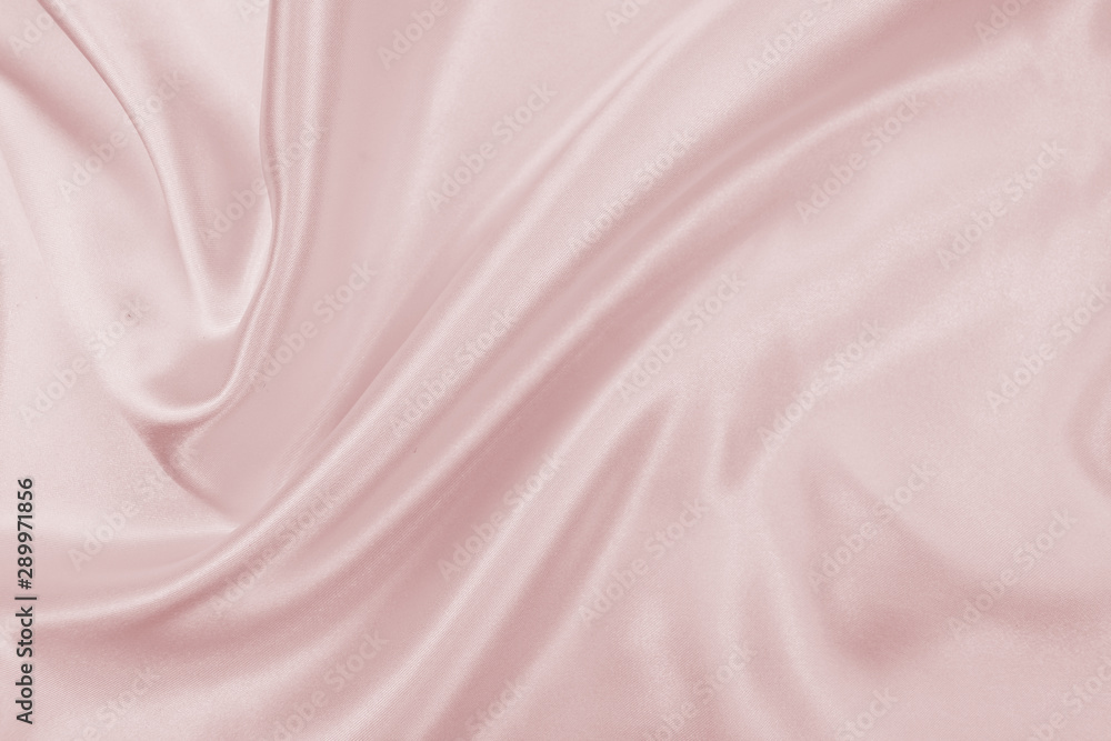 Delicate satin draped fabric pink texture for festive backgrounds Delicate satin draped fabric pink texture for festive backgrounds