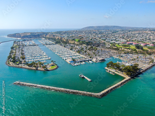 Aerial view of Dana Point Harbor and her marina with yacht and sailboat. southern Orange County, California. USA © Unwind