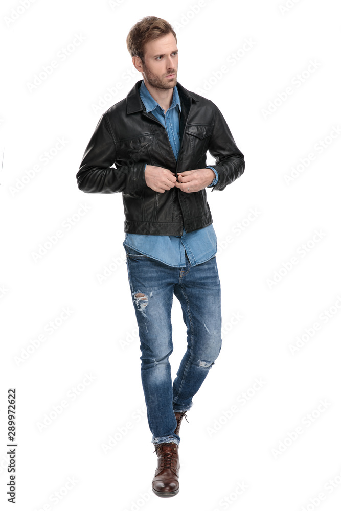 man fixing his jacket man fixing his jacket