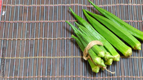 Okra or Ochro, Gumbo on wooden table