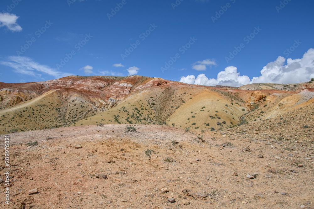 Valley of Mars landscapes in the Altai Mountains. Rainbow mountains. Ground con.tains mercury, that's why it looks like Mars planet. Altai. Nature of Siberia, Russia
