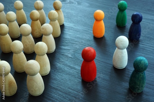 Diversity and Inclusion concept. Wooden and colored figurines.