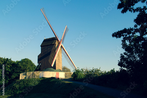 Koelewei Windmill along the walkway around the city of Bruges, Belgium © arnaud