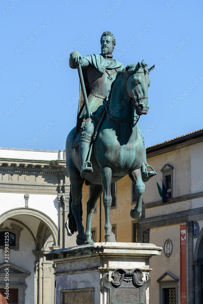 Obraz premium The equestrian statue of Ferdinand I Medici is paired with the statue of Cosimo I. The sculpture of the Grand Tuscan Duke in full dress,with weapons and orders. One of the main attractions of Florence