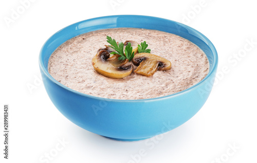 Mushroom cream soup, champignon and parsley isolated on white background.
