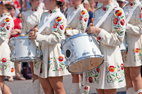 Marching band drummers perform, drummers parade in ukrainian costume photo