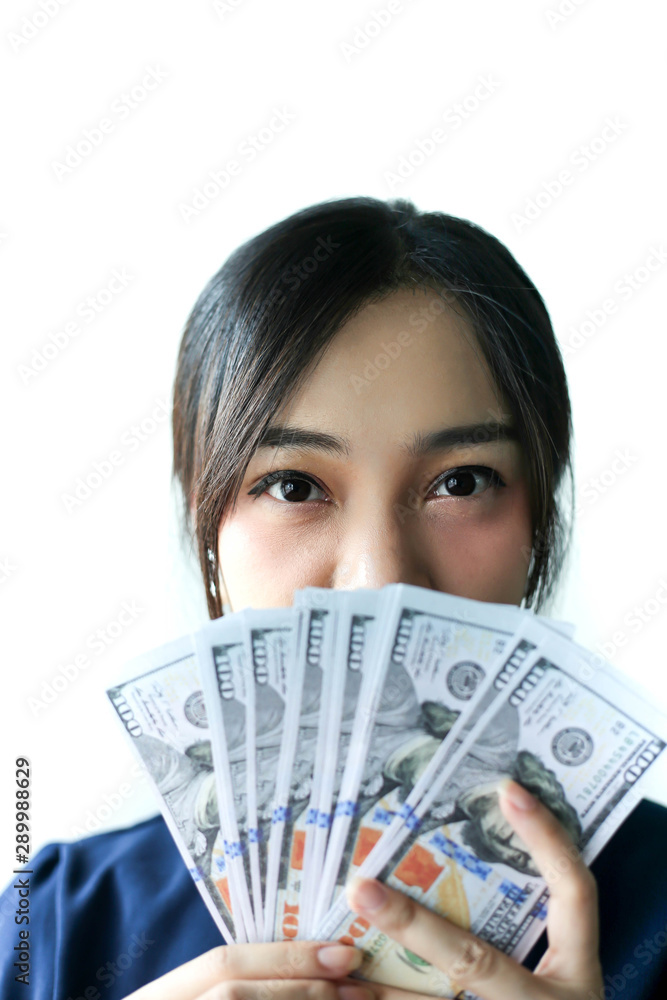 Portrait Asia smiling woman with dollars in hand,happy to have money concept. Portrait Asia smiling woman with dollars in hand,happy to have money concept.