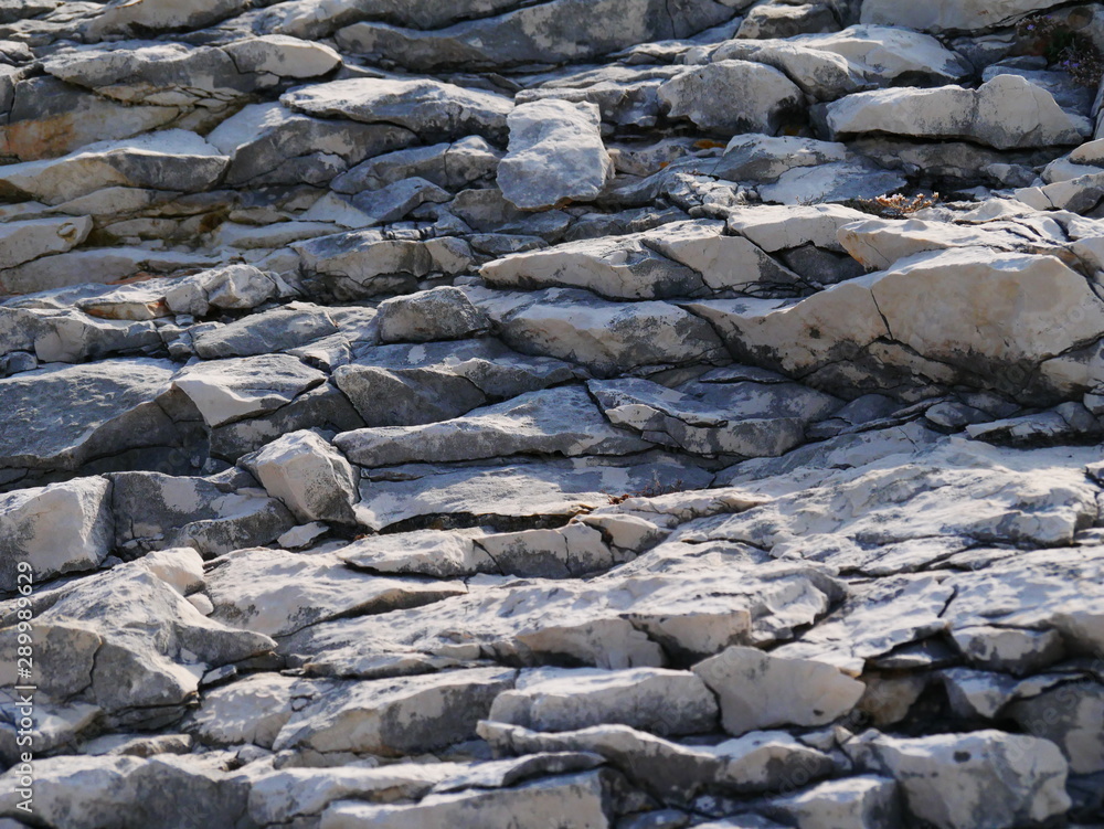 Hintergrund: Steine an der Küste
