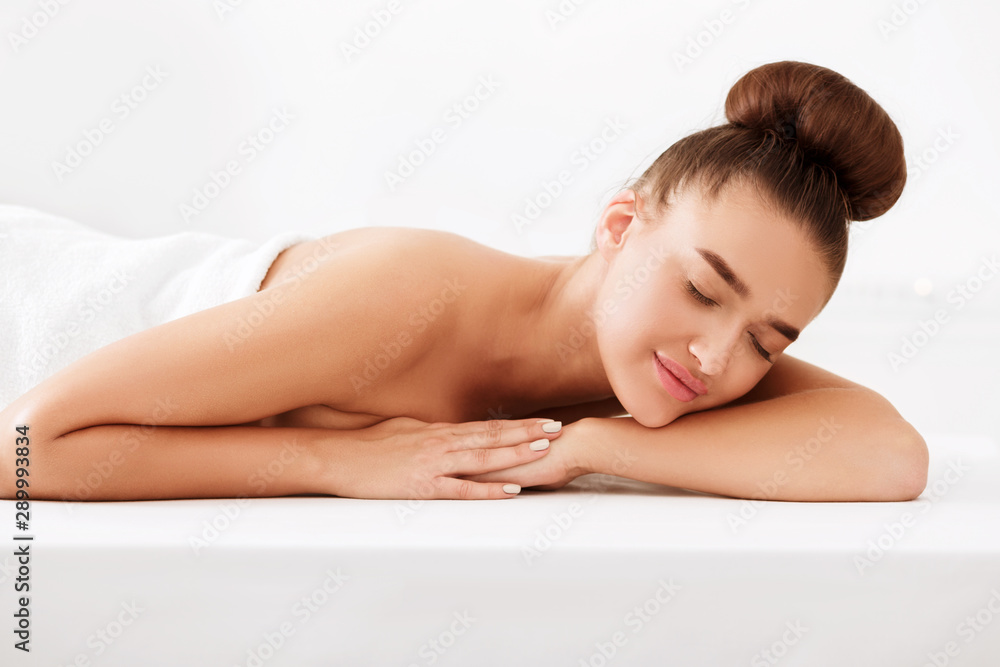 Spa and wellness. Woman relaxing with closed eyes Spa and wellness. Woman relaxing with closed eyes