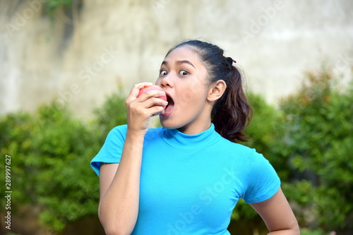 Wallpaper Mural Pretty Diverse Female Eating With An Apple Torontodigital.ca