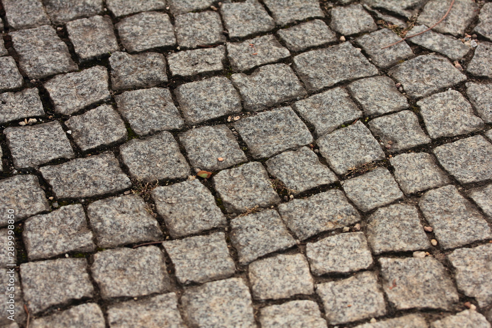 Granite cube, Overhead view of cobblestone street texture
