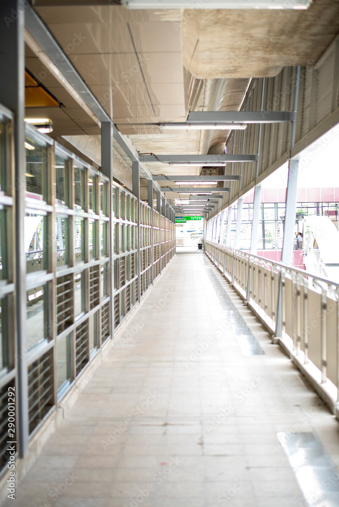 Fototapeta premium The corridor connects sky train the central-ladpra Bangkok, Thailand
