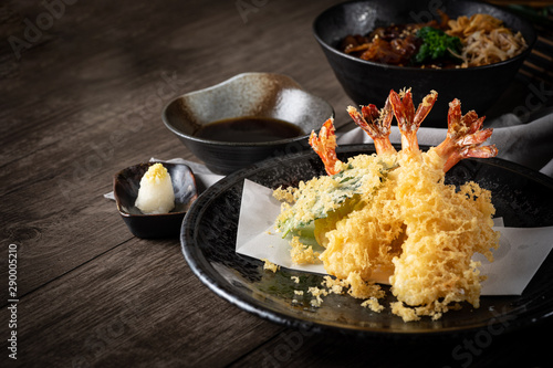 The tempura shrimps with sauce, deep-fried shrimps in the traditional Japanese restaurant.