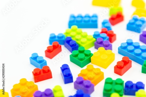 plastic toy bricks . preschool children funny activity .