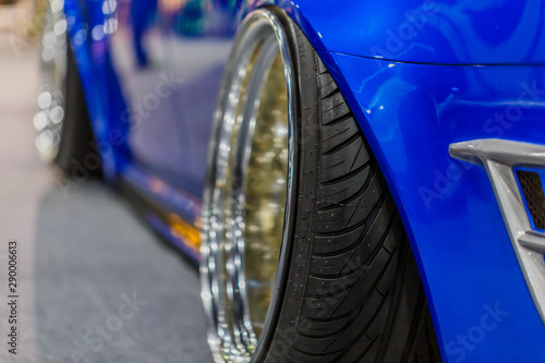 Blue modern car closeup Exterior detail, shallow depth of field