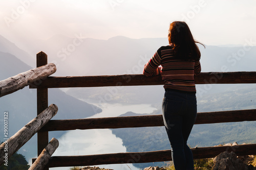 Woman in jeans at the lake Perucac mountain Tara