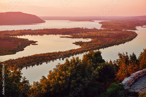 Evening view of the Volga River from an observation platform near Samara, pink sunset over the Zhigulev mountains.