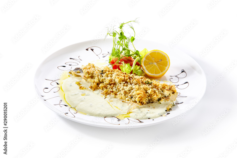 Breaded Pike Perch or Zander Fillet with Cream Sauce Isolated Breaded Pike Perch or Zander Fillet with Cream Sauce Isolated