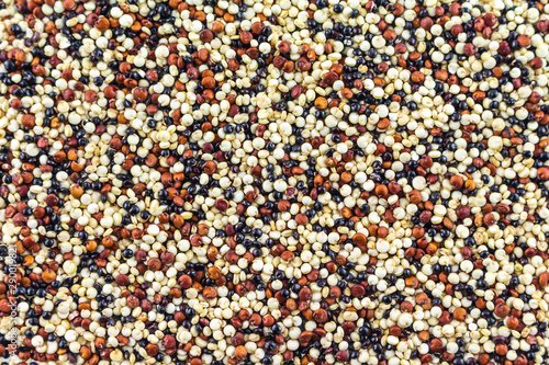 pile quinoa on texture background.