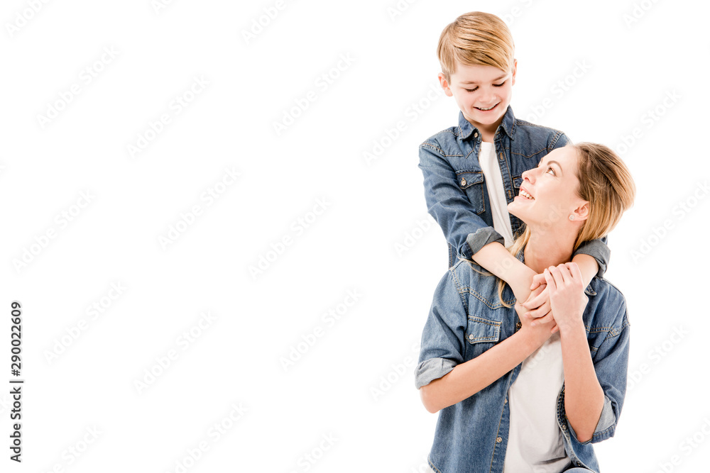 happy mother and son embracing isolated on white happy mother and son embracing isolated on white