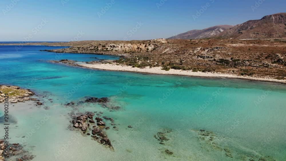 Aerial shot of beautiful turquoise beach Elafonisi Crete Greece. Stunning beautiful sea landscape beach with turquoise water. Aerial shot of beautiful turquoise beach Elafonisi Crete Greece. Stunning beautiful sea landscape beach with turquoise water.