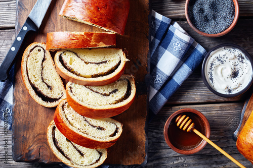 Poppy cake, Makovnjaca on a wood board photo