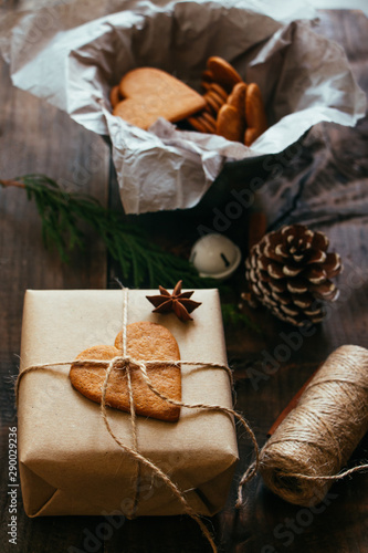 Rustic Christmmas present with gingerbread cookie