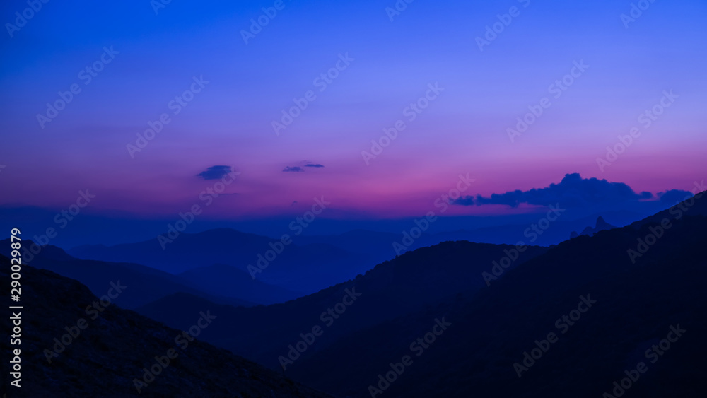 Purple sunset in the mountains
