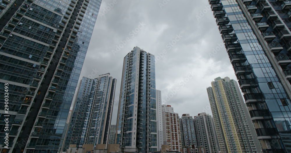Modern building in city with storm of the cloud