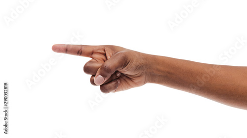 Obraz na plátne Black woman's hand pointing finger at somebody, isolated on white