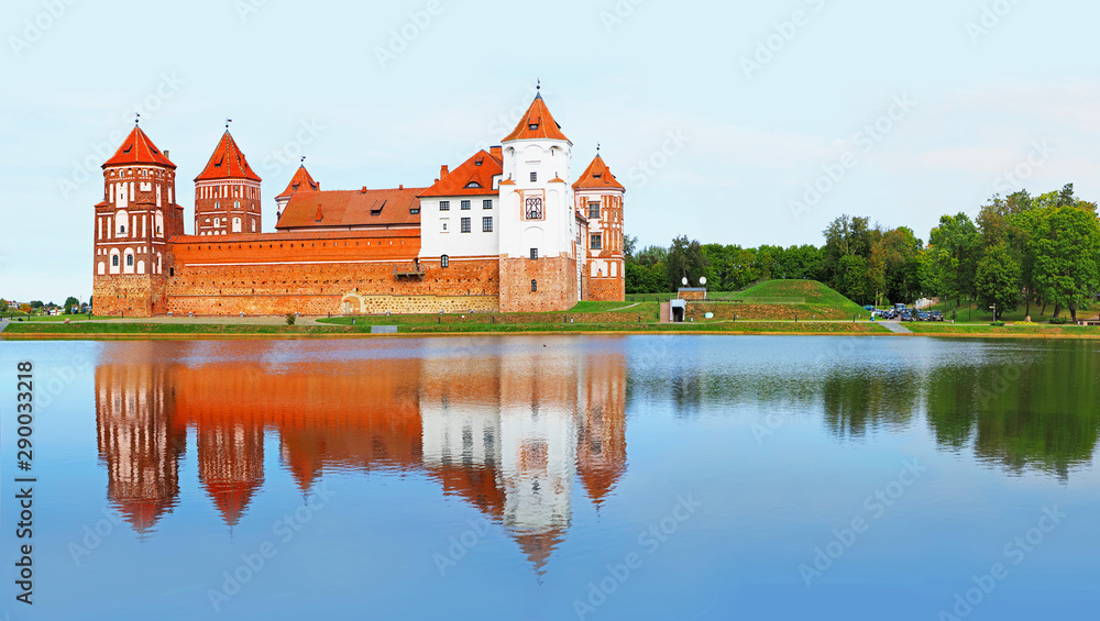 Mir, Belarus. Mir castle complex, reflection in water. Architectural ensemble, cultural monument. Famous landmark, panoramic view