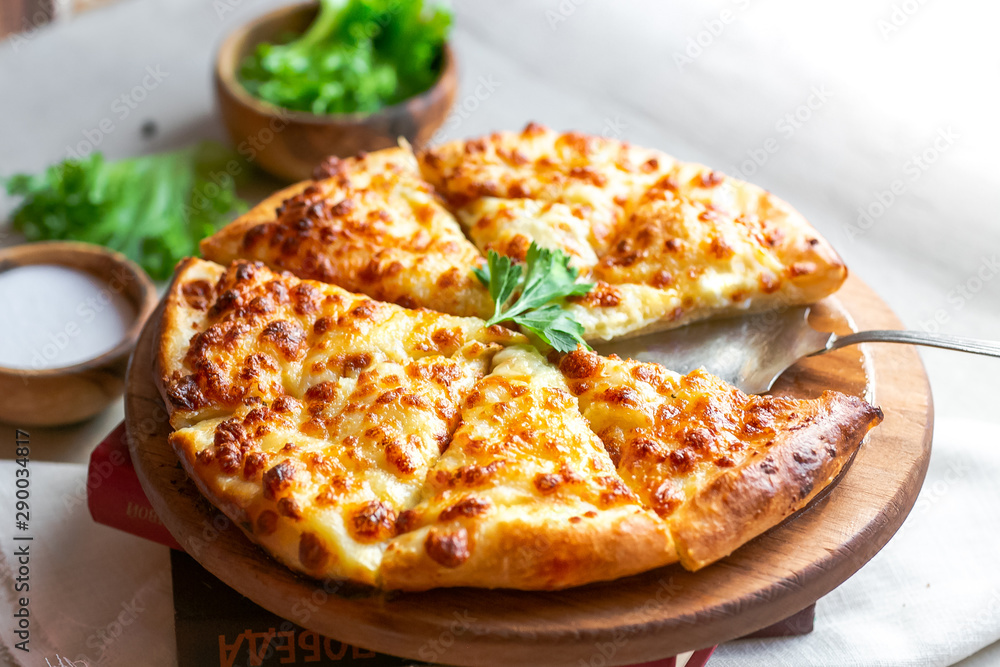 Khachapuri georgian cheese pie with greens