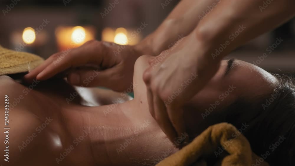 custom made wallpaper toronto digitalCU Relaxed woman receiving face massage with candles at background. Young woman came in spa center for anti-agin or face lifting massage. Close-up of relaxed woman with closed eyes at spa salon. 4k