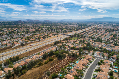 Aerial view of houses and mountains in California © MARIO