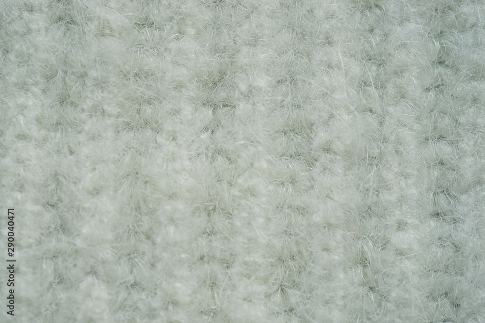 Fototapeta premium Background with knitted white texture.