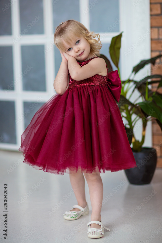 happy little girl in a beautiful magnificent dress happy little girl in a beautiful magnificent dress
