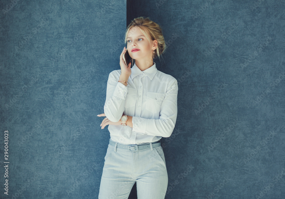 successful business lady with a smartphone successful business lady with a smartphone