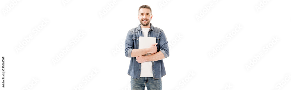 panoramic shot of smiling man in denim shirt holding laptop isolated on white panoramic shot of smiling man in denim shirt holding laptop isolated on white