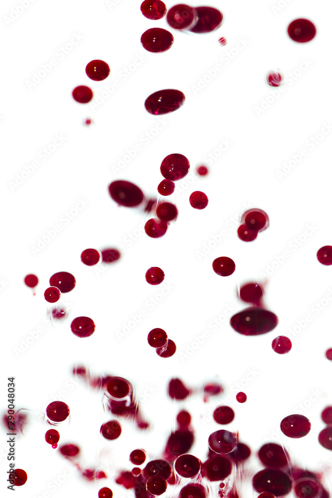 Burgundy abstract pebbles trapped in wax