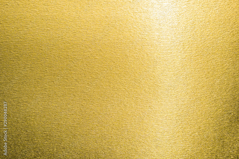 Gold texture background metallic golden foil or shinny wrapping paper bright yellow wall paper for design decoration element Gold texture background metallic golden foil or shinny wrapping paper bright yellow wall paper for design decoration element