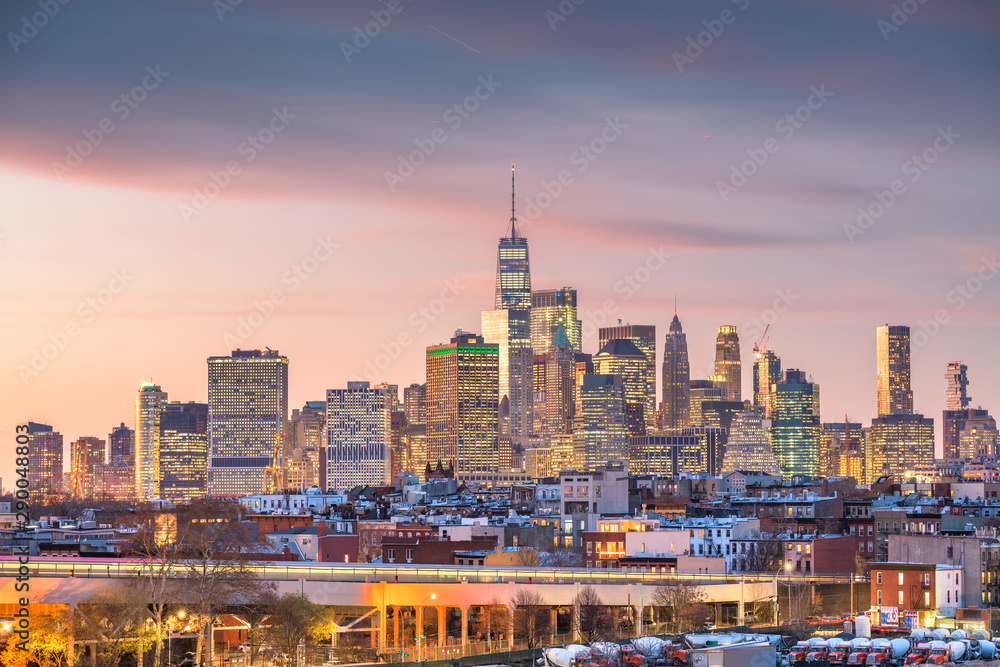 New York City, USA midtown Manhattan skyline at dusk from Brooklyn