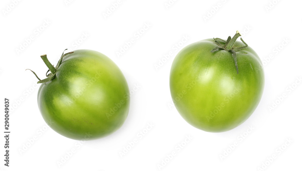 Green unripe tomatoes isolated on white background, top view Green unripe tomatoes isolated on white background, top view