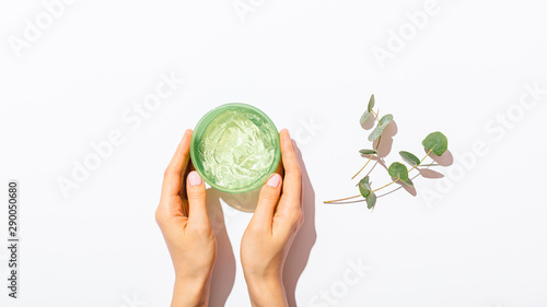 Female's hands holding jar