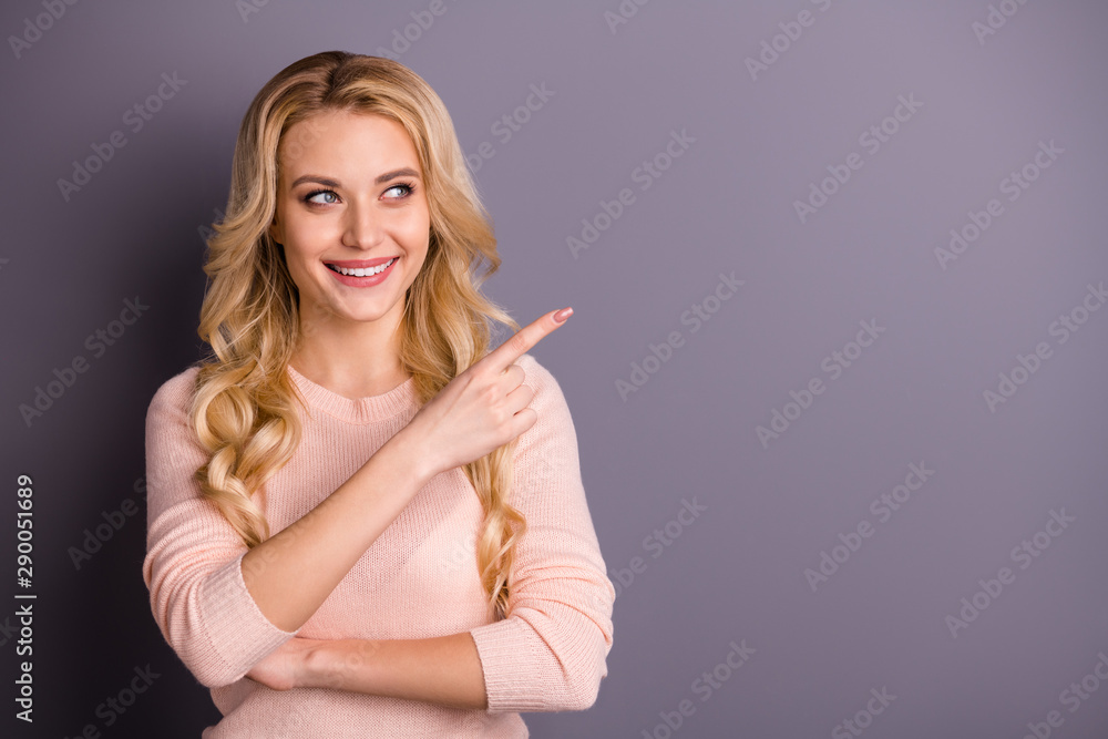 Portrait of her she nice-looking attractive lovely cheerful cheery positive glad wavy-haired girl pointing forefinger aside copy space advert solution isolated over gray pastel color background Portrait of her she nice-looking attractive lovely cheerful cheery positive glad wavy-haired girl pointing forefinger aside copy space advert solution isolated over gray pastel color background