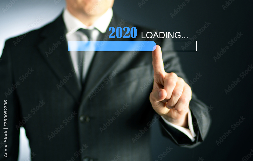Businessman hand pressing an imaginary button new year Businessman hand pressing an imaginary button new year
