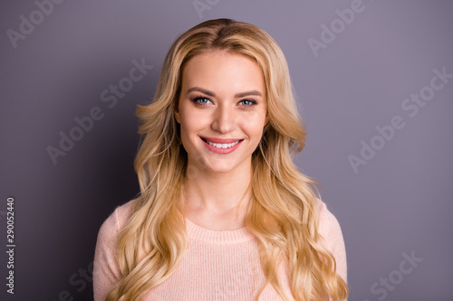 Close-up portrait of her she nice-looking attractive lovable lovely cute shine winsome content cheerful cheery wavy-haired girl isolated over gray pastel color background