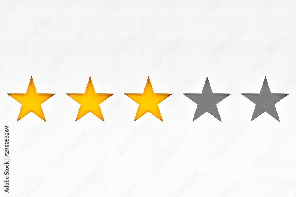 Fototapeta premium Star symbol (from one to five), hand made from cardboard, the concept of a positive or negative rating, reviews and feedback.