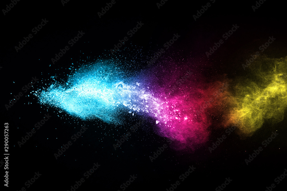 Fototapeta Explosion of colored powder isolated on black background. Abstract colored background. holi festival.